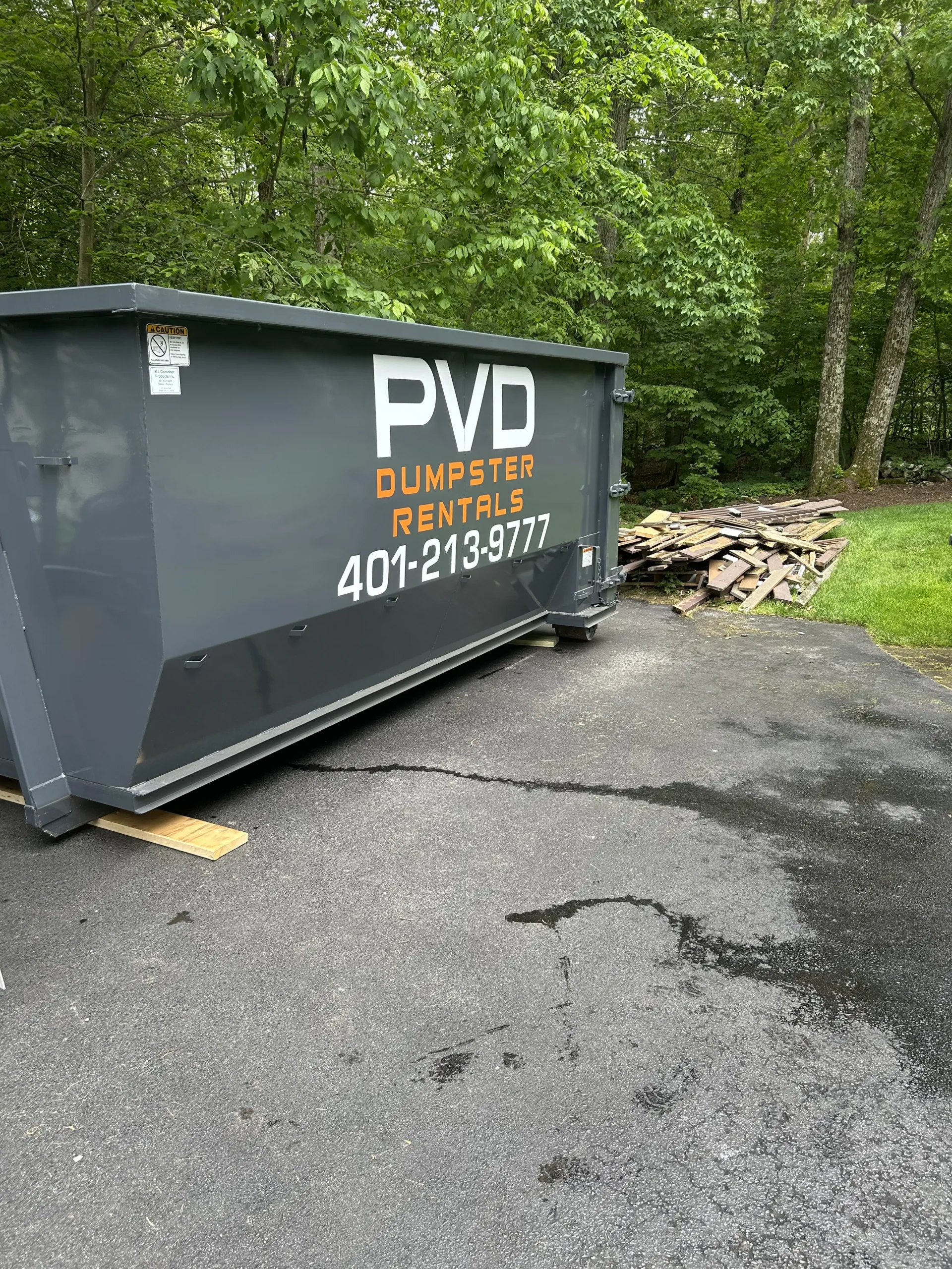20 yard dumpster loaded with demolition debris on a demolition job in Cranston