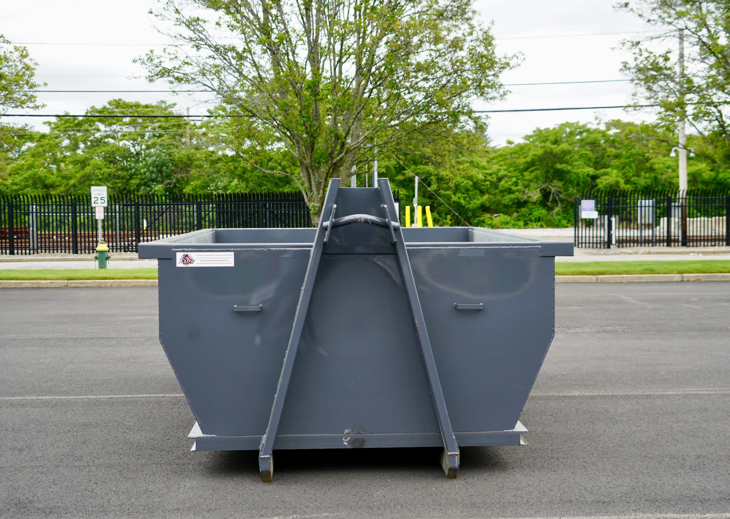 Clean roll-off dumpster interior before loading